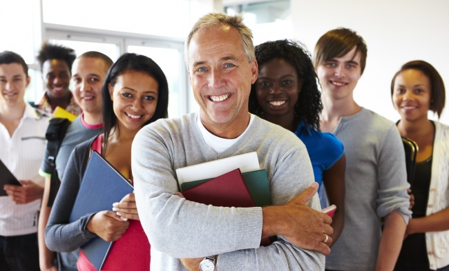 Male teacher with students